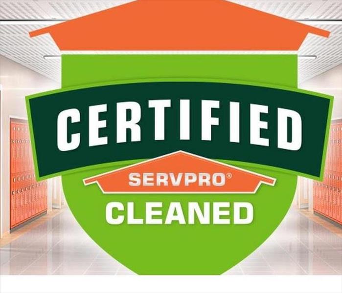 Certified: SERVPRO Cleaned badge a green and orange shield