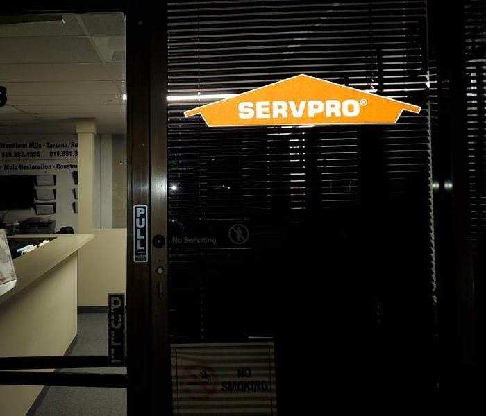SERVPRO front door sign at night