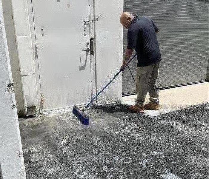 Technician Performing Cleaning Services 